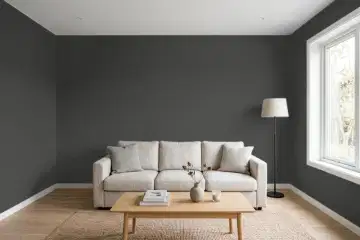 Living room with walls painted Sherwin-Williams Iron Ore SW 7069 (simulated)